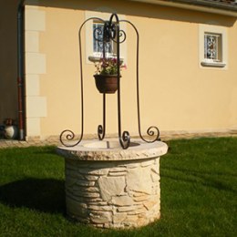 puits en pierre reconstituée pour décoration